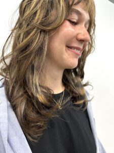 Hidden "peek-a-boo" horizontal hair bands in a blonde and charcoal tone.