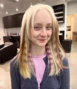 A single (or few), subtle section of raccoon stripes tucked behind the ear for a minimalist look.