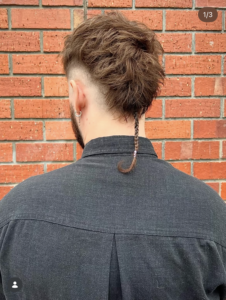 High-fashion gender-neutral Ragtail style showcasing how the cut works across different hair textures and identities.