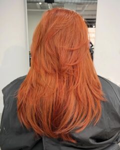A spectrum of 2026 orange hair shades including Honey Apricot, Autumn Ginger, and Electric Tangerine, showcased at Assort Osaka.
