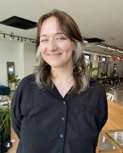 Close-up of inner silver color at Assort Osaka, featuring a cool metallic peek-a-boo section hidden under natural dark hair.