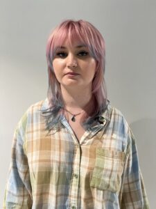 Ethereal light pink hair featuring soft, light blue dip-dyed ends.